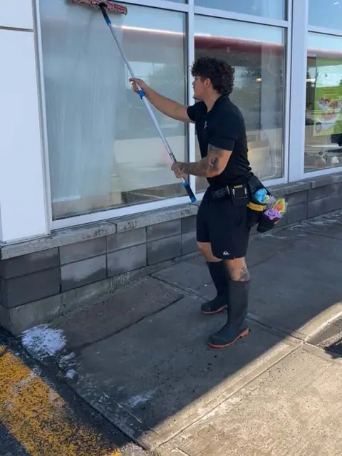 Window cleaning with a telescopic pole